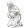 Mujer bañando al Niño